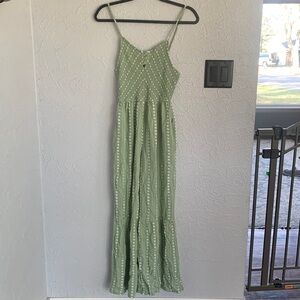 Green floral jumper.